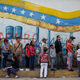 Venezuelans queue to cast their vote